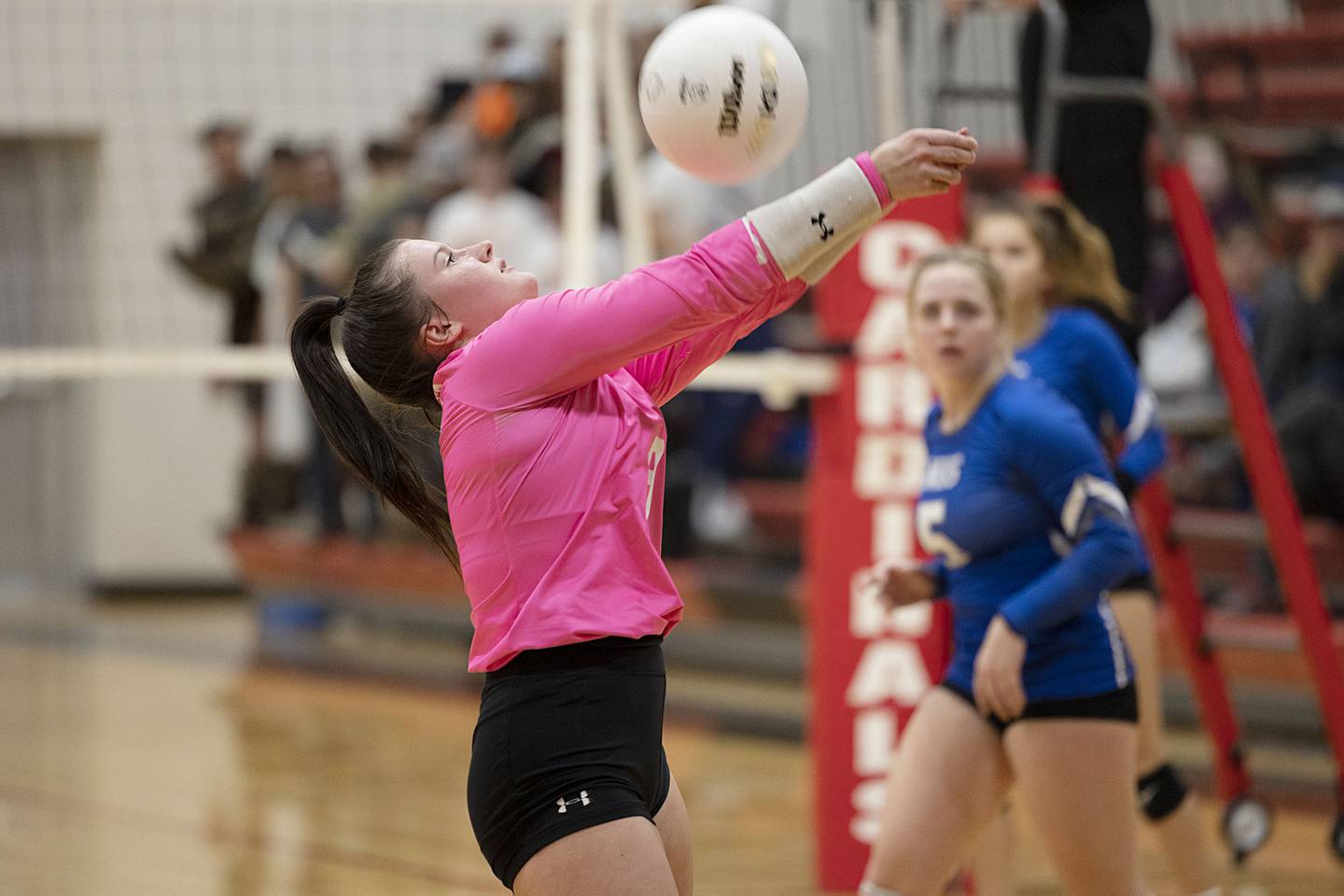 Newman’s Addison Foster passes the ball in the semifinal sectional game Monday, Oct. 31, 2022 against Newark.