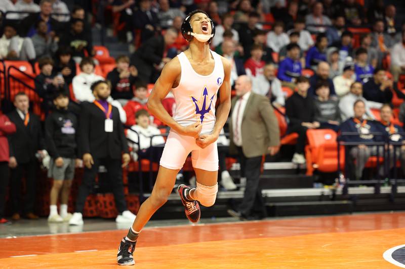 Warren’s Caleb Noble celebrates his win over Hononega’s Rocco Cassioppi in the 106-pound Class 3A state championship match on Saturday, Feb. 17th, 2024 in Champaign.