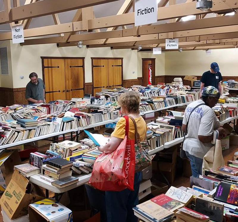 Attendees at the 2023 Free Book Reuse and Recycling Event. The 2024 event, where thousands of free books will be available to the public, will be from 9 a.m. to 4 p.m. Friday, May 31, and Saturday-Sunday, June 1-2, at Joliet Park District’s Pilcher Park Nature Center.