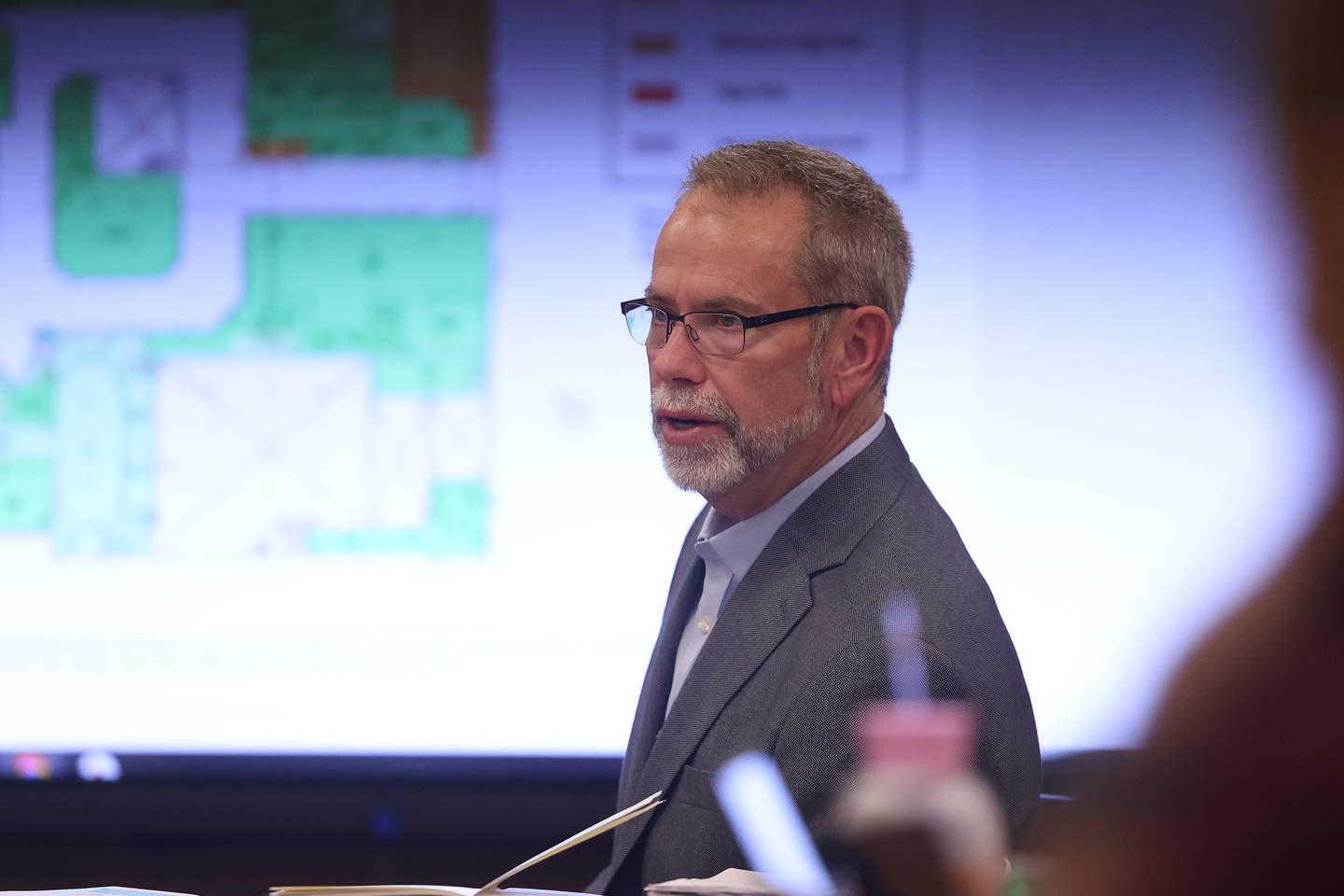 DLA Architects Principal and Director of Operations Eric Sickbert goes over the risk assessment of the Central campus ceiling at the Lockport Board of Education meeting on Monday, Nov. 20, 2023, in Lockport.