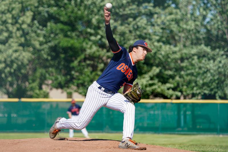 Oswego’s Nick Tickle (5) delivers a pitch against Hinsdale Central during a Class 4A Waubonsie Valley Regional semifinal baseball game at Waubonsie Valley High School in Aurora on Wednesday, May 22, 2024.