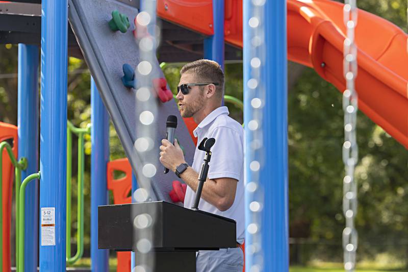 Seth Nicklaus, recreation director for the Dixon Park District, opens the new playground Thursday, Oct. 5, 2023 at Vaile Park.