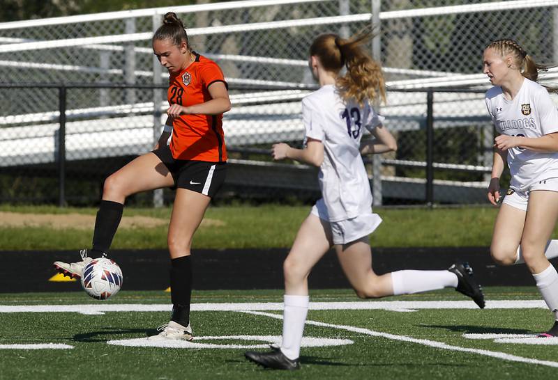 Crystal Lake Central's Jillian Mueller controls the ball in front of Wauconda's Morgan Aldrich during the IHSA Class 2A Grayslake North Regional championship soccer match on Friday, May 17, 2024, at Grayslake North High School.