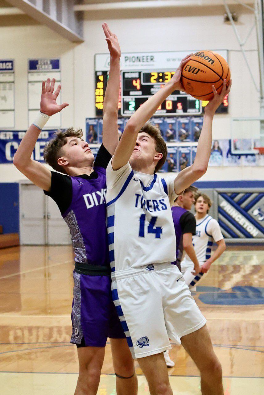 Princeton's Jackson Mason goes up strong for a shot against Dixon Monday night at Prouty Gym. The Dukes won 61-50.