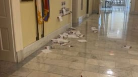 ‘A vile act of hate’: Display of hostages outside U.S. Rep. Schneider’s office vandalized