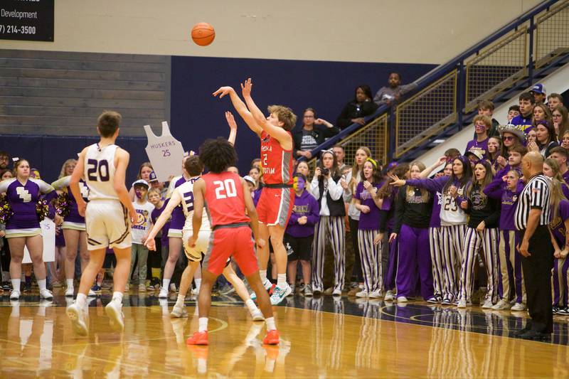 Aurora Christian's Cam Morel shoots a three pointer for his 1,000 th point at the Class 1A Boy's Basketball  Super Sectional against Serena on Friday , March 1, 2024 at Harvest Christian Academy  in Elgin.