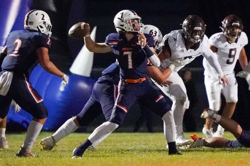 Oswego’s Brett Connolly (7) throws a pass against Joliet Catholic during a football game at Oswego High School on Friday, Sep 6, 2024.