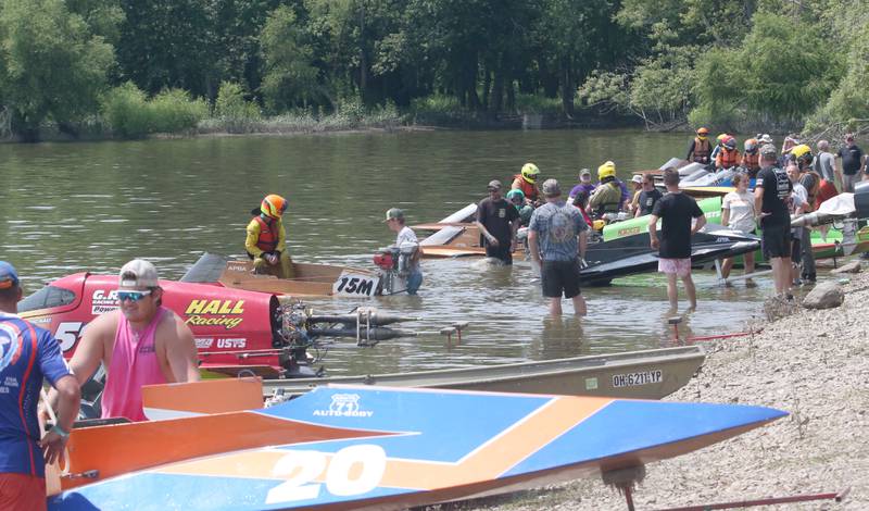 Drivers begin to get ready in the pits as they prepare to race during the US Title Series Pro National Championship Boat Races on Friday, July 26, 2024 at Lake DePue.