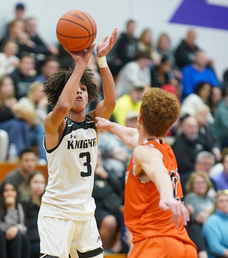 Photos Kaneland vs. Sandwich boys basketball in the 60th Plano