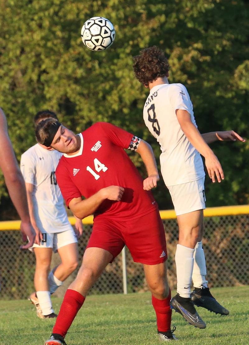 Bloomington Central Catholic's Benjamin Dappen beats Streator's Landon Muntz to a header on Wednesday, Aug. 23, 2023 at St. James Street Recreation Area in Streator.