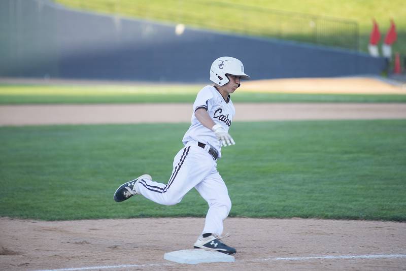 Joliet Catholic’s Tommy Kemp rounds third to score against Columbia Friday, June 3, 2022 during the IHSA Class 2A baseball state semifinal.