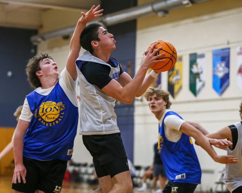 Riverside-Brookfield's Danny Loftus puts up a shot at the Riverside-Brookfield Summer Shootout basketball tournament. June 22, 2024.