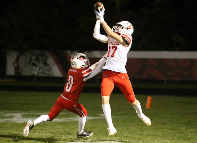 Ottawa's Owen Sanders makes a catch over Streator's Layzeric Moton to score a touchdown on Friday, Sept. 6, 2024 at Doug Dieken Stadium.