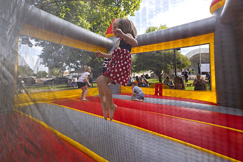 Elowynn Henry, 4, of Sterling enjoys the bounce house Tuesday, August 1, 2023 during the Sterling Police Department’s celebration of National Night Out.