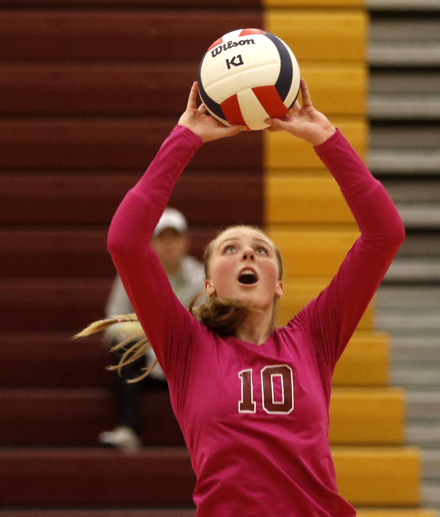 Richmond-Burton's Alex Hopp sets the ball during a Kishwaukee River Conference volleyball match against Woodstock North  Wednesday, Oct.11, 2023, at Richmond-Burton Community High School.