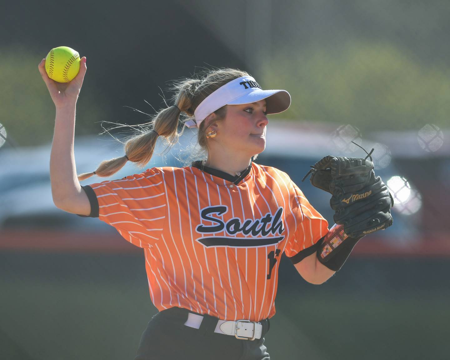 Wheaton Warrenville South's Brooke Struebing (16) throws to first base for an out while taking on Wheaton North on Friday April 19, 2024, while taking on Wheaton North.