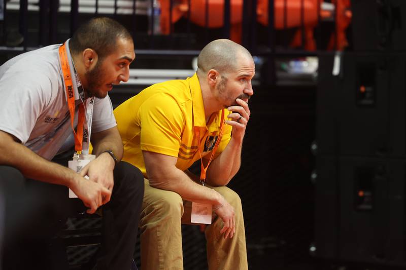 Joliet West head coach Charles Rumpf watches Carson Weber take on Batavia’s Aidan Huck in the 144-pound Class 3A state 3rd place match on Saturday, Feb. 17th, 2024 in Champaign.