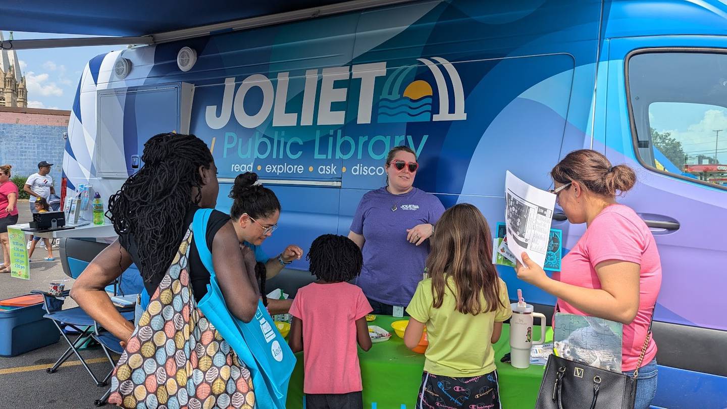 The Joliet Public Library’s new outreach van: “JPL On-the-Go” made an appearance at Saturday’s Kidz Fest in downtown Joliet. JPL On-the-Go features books, a bubble machine, exterior awning, mobile WI-FI and a TV screen.