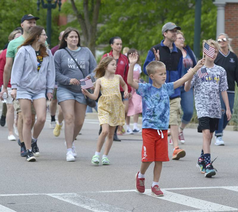 Children from the Ottawa Ottawa Elementary School District, march down Columbus during the annual Memorial Day Parade in Ottawa.