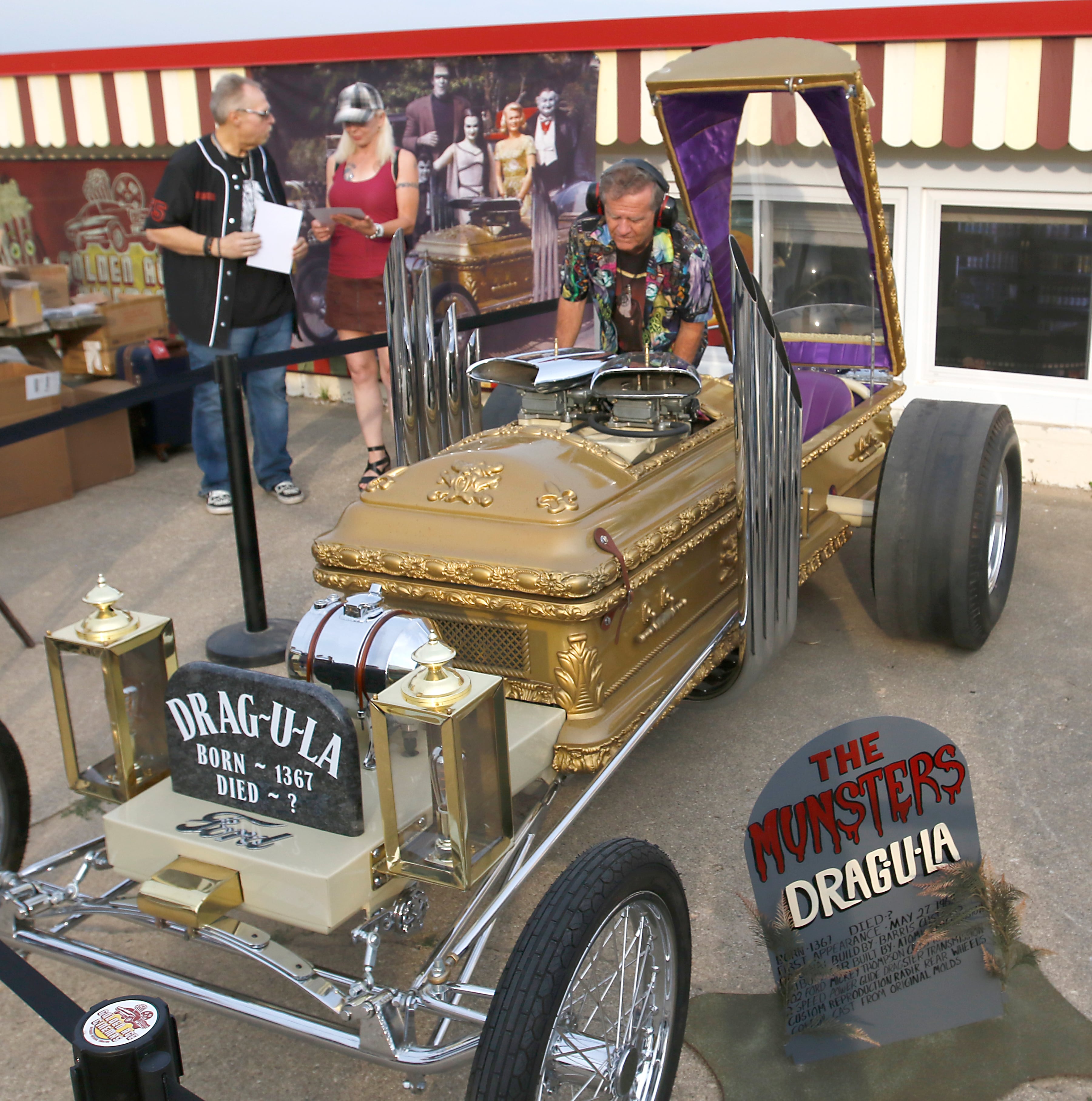 Butch Patrick, who played Eddie Munster on the 1960s show “The Munsters” starts the the “Drag-u-la” car for fans on Wednesday, Aug. 14, 2024, during an appearance at the McHenry Outdoor Theater.