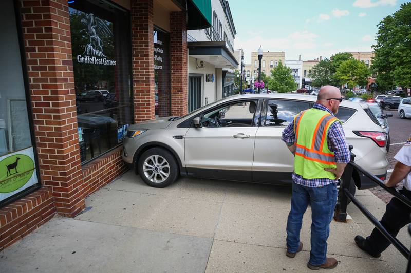 Minimal damage to the building and minor injuries to the driver were reported on Thursday, May 23, 2024, when a vehicle crashed into a building on the historic Woodstock Square.
