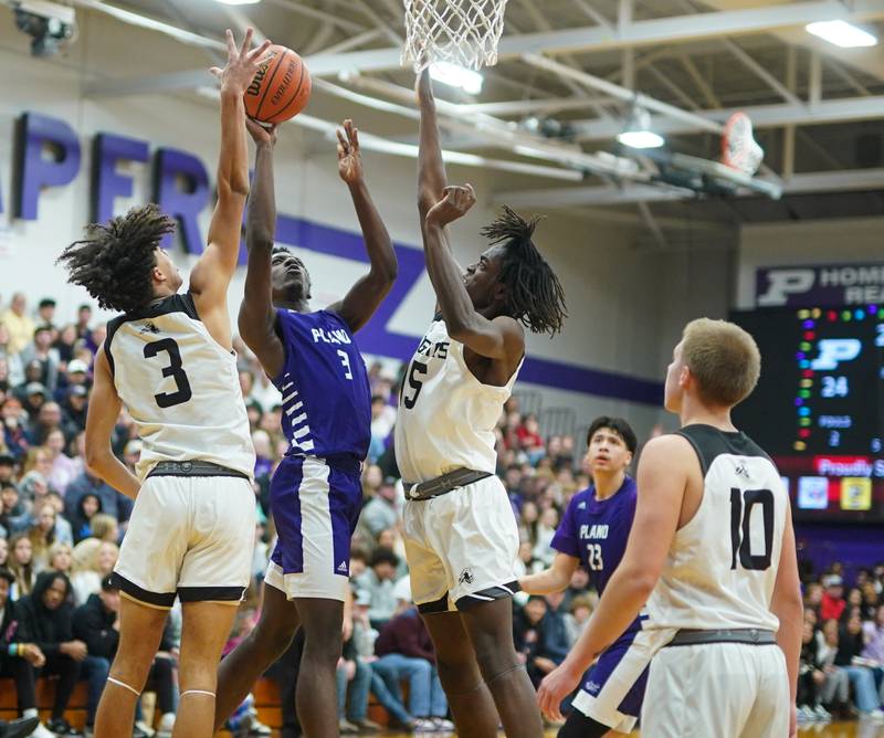 Photos Kaneland vs. Plano boys basketball in 60th Plano Christmas