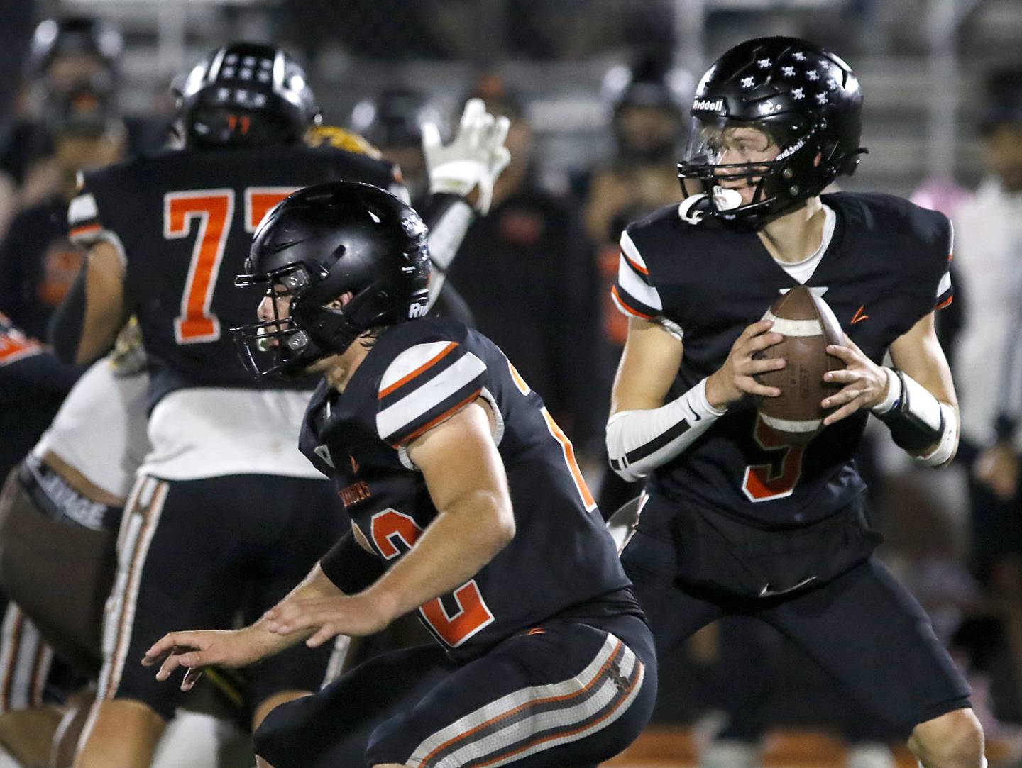 McHenry's Conner McLean pass blocks for quarterback Dayton Warren during a Fox Valley Conference football game against Jacobs on Friday, Oct. 18, 2024, at McKracken Field in McHenry.