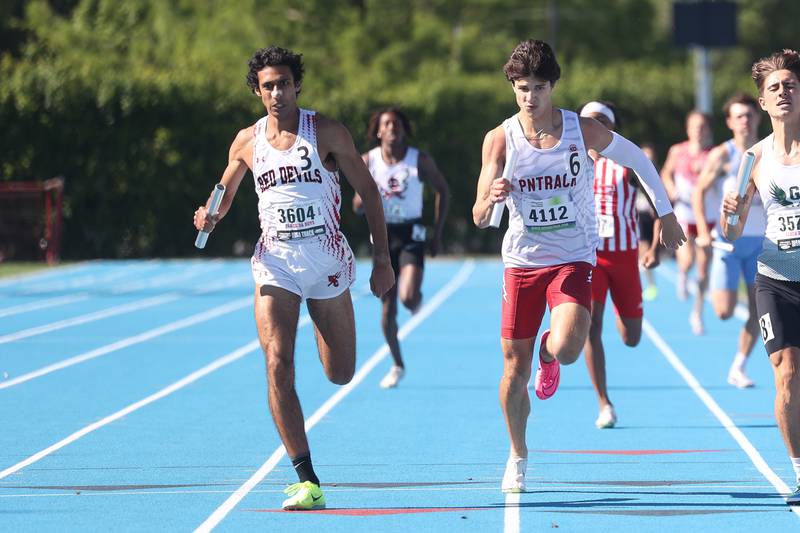 Hinsdale Central’s Aden Bandukwala and Plainfield North’s Easton Miller finish 2nd and 3rd, respectively, in the Class 3A 4x400 Meter Relay State Championship on Saturday, May 25, 2024 in Charleston.