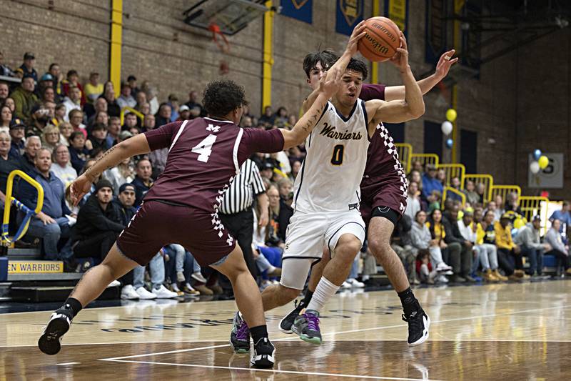 Sterling’s Andre Klaver drives to the hoop against Moline Friday, Dec. 1, 2023 in Sterling.