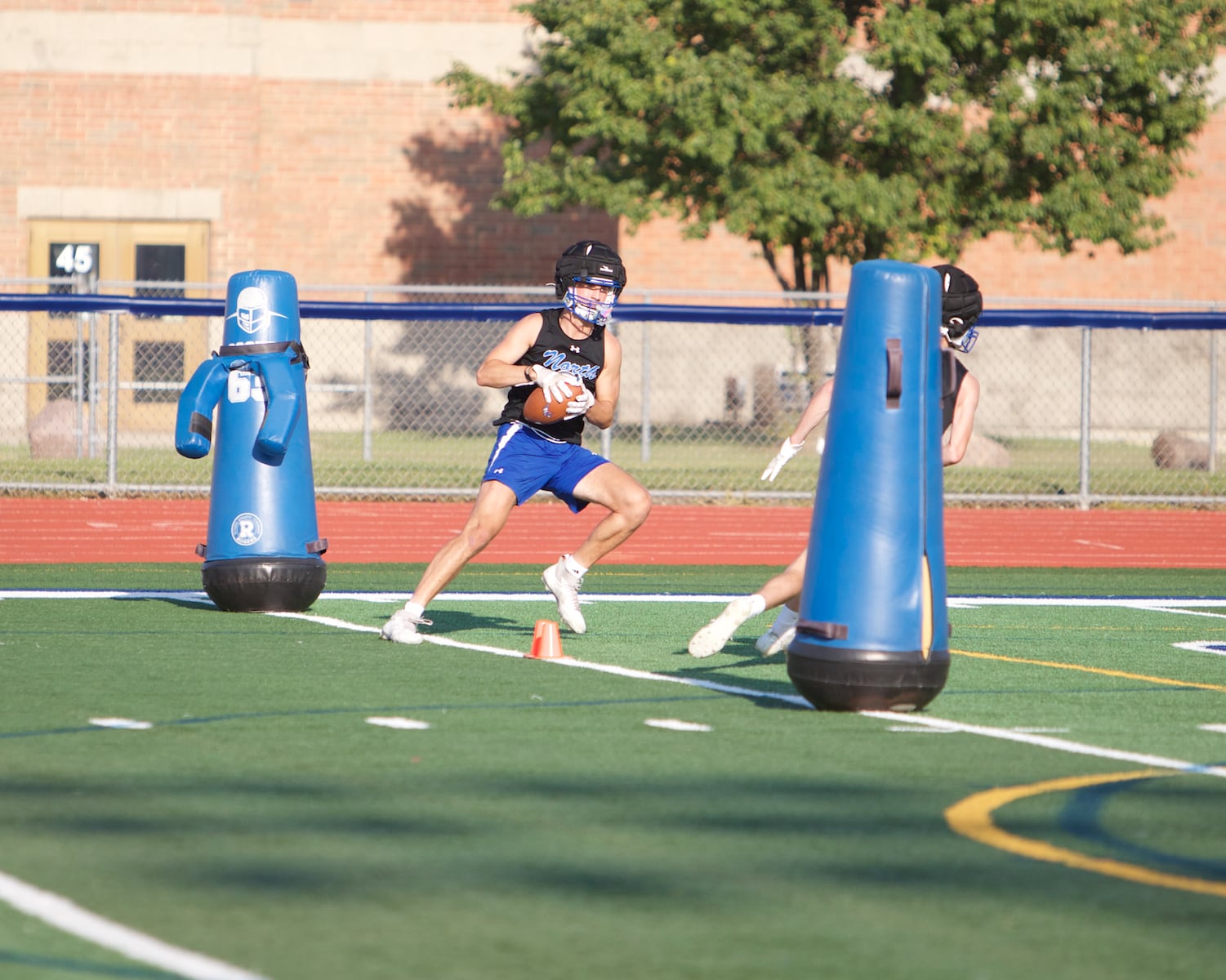 St. Charles North running drills during the first day of practice on Monday Aug.12,2024 in St. Charles.