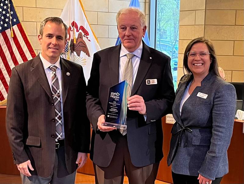 Peter Wallers, engineering consultant for the village of Montgomery, center, and Village President Matt Brolley, left, and Erin Aleman, executive director of the Chicago Metropolitan Agency for Planning.