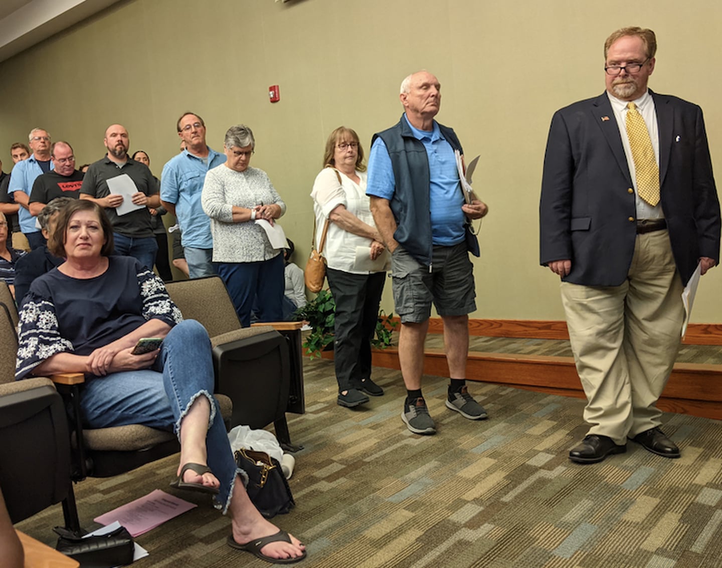 Residents line up at the Sept. 7 Oswego Planning and Zoning Commission to speak in opposition to a proposed outdoor cricket stadium.