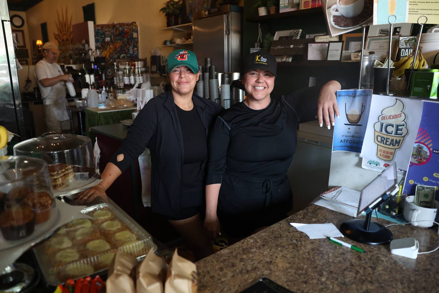 Sisters Hope Shelby, left, and Amber Duffy help run their mother Gina Duffy’s Jitters coffee house along North Chicago Street in downtown Joliet on Monday July 8, 2024.