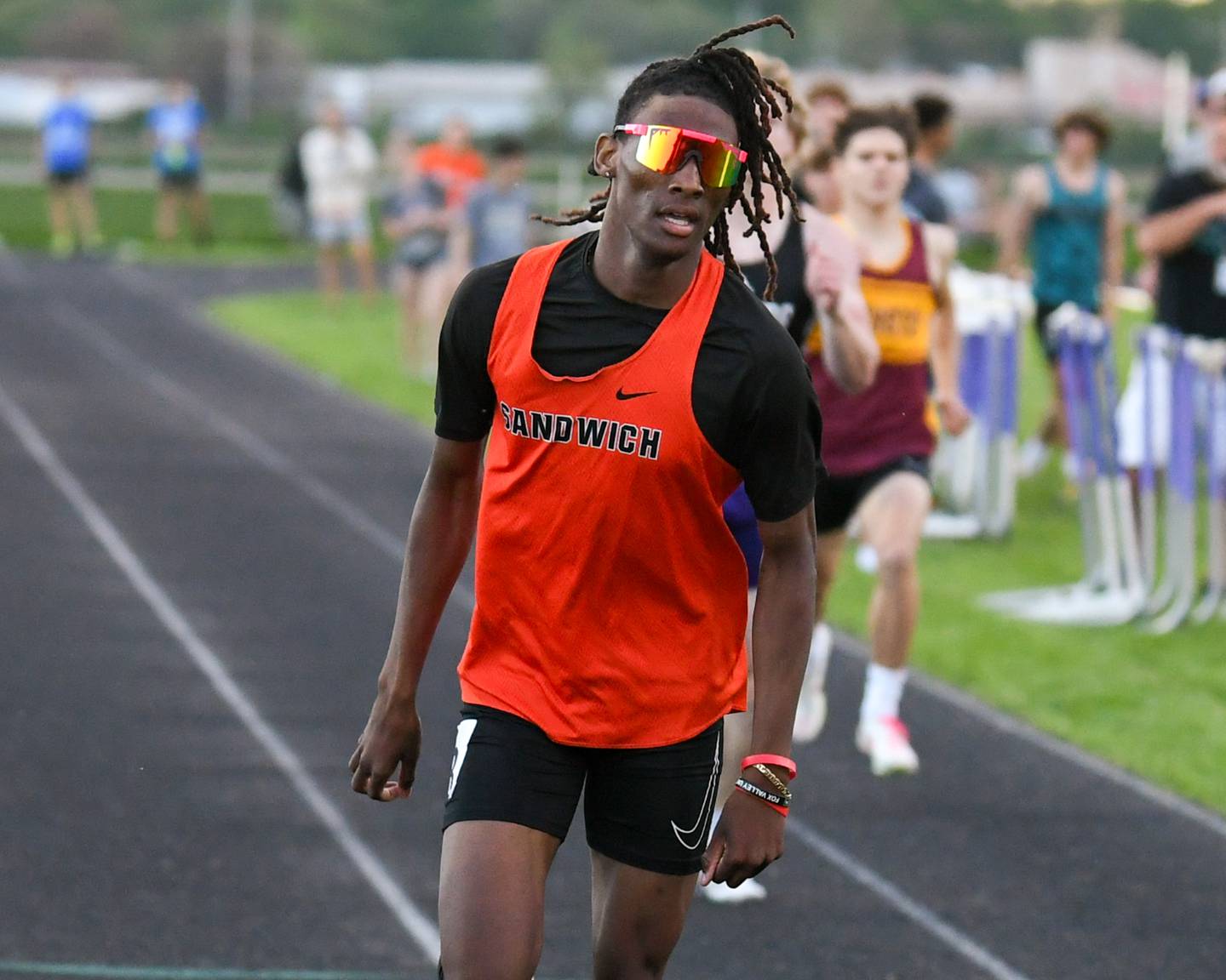 Simeion Harris of Sandwich competes in the 400-meter run during the Kishwaukee River Conference track meet this past spring at Plano High School.