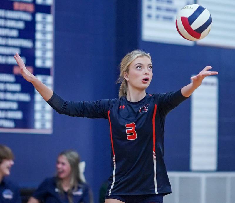 Oswego’s Riley Borrowman (3) serves the ball against Romeoville during a volleyball game at Oswego High School on Tuesday, Oct. 17, 2023.