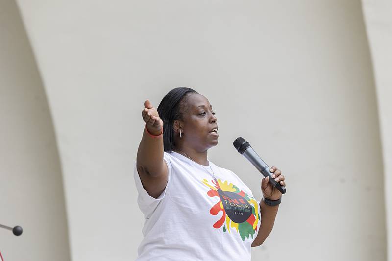 Tina Wren, president of the Sauk Valley Diversity Alliance, greets the crowd Saturday, June 22, 2024, during the organization's Juneteenth celebration in Sterling.