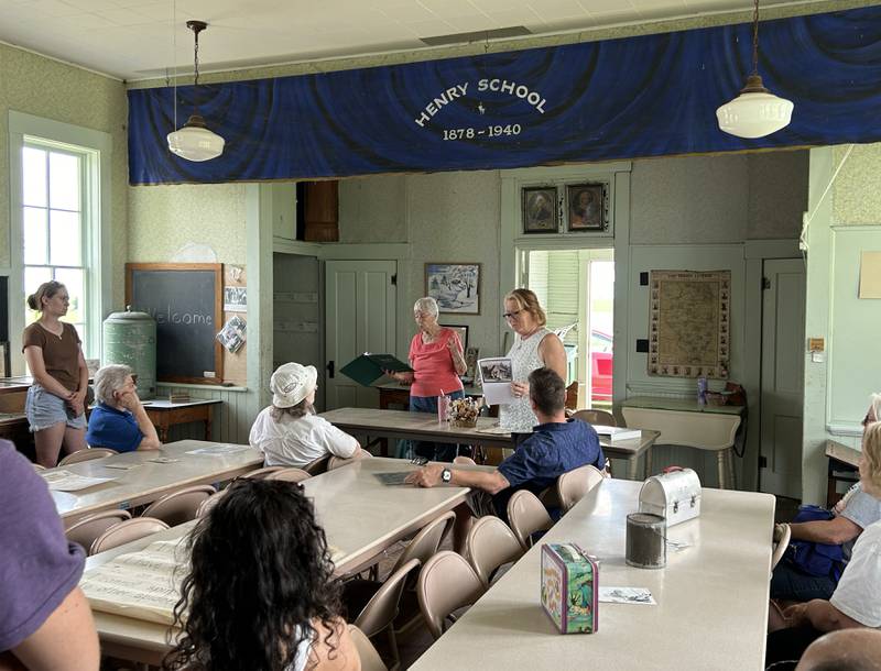 Polo Historical Society members Betty Obendorf (left) and Paula Faivre talk about  the Henry School during Town & Country Days on Saturday, June 15, 2024. The historic one-room schoolhouse was one of the stops on the historical society's Trolley Tours.