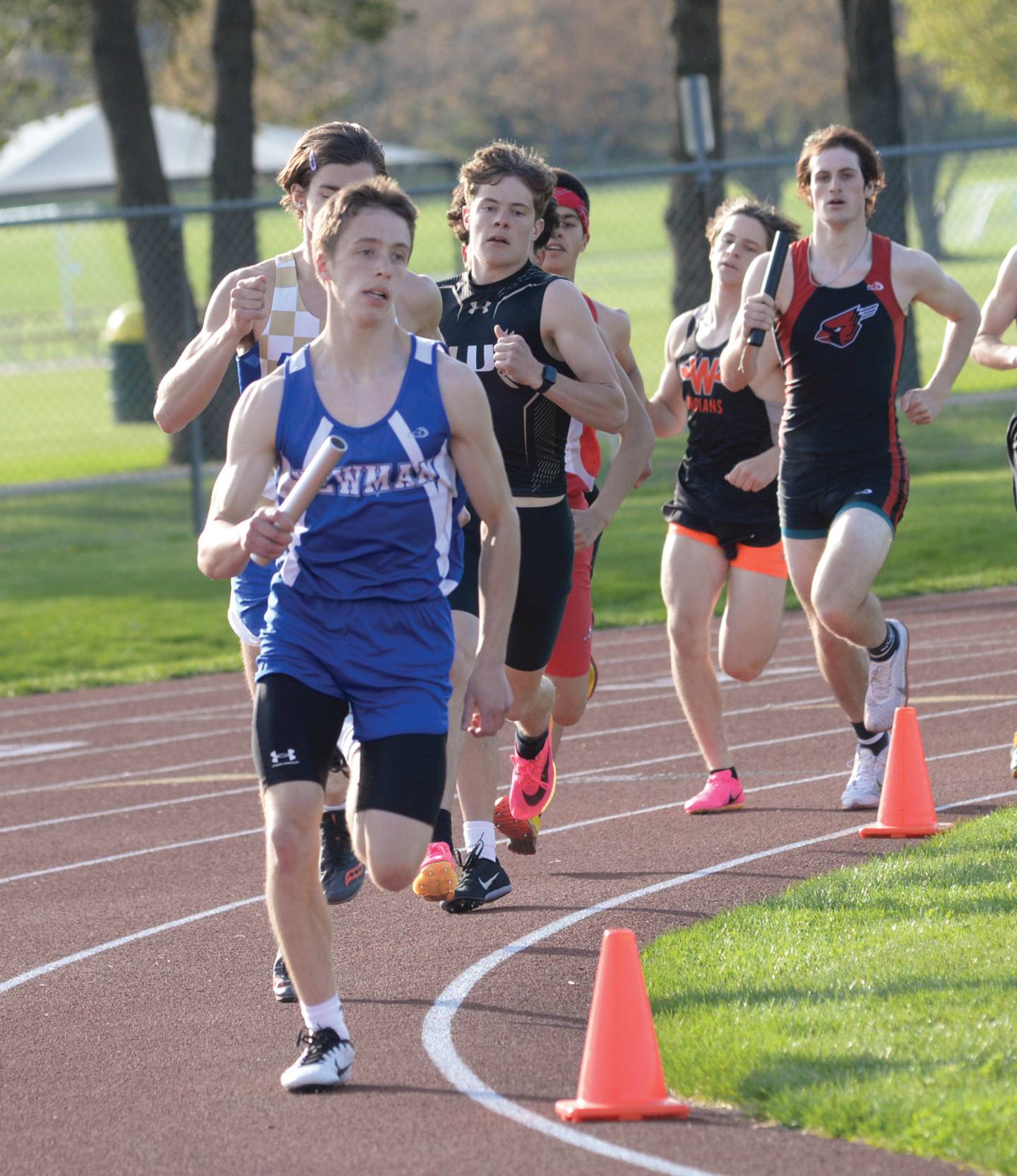 A Newman runner leads the pack in the 4x800 relay during the Oregon Hawk Classic at Landers-Loomis Field in Oregon on Friday, April 28.