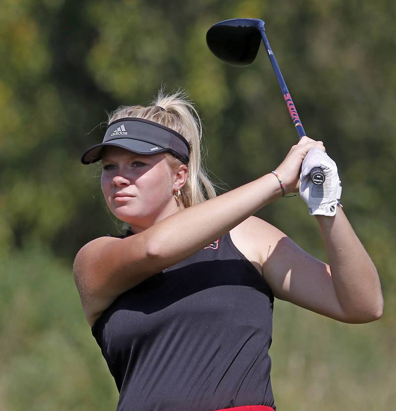 Huntley’s Maddie Sloan watches her tee shot on the 6th hole of the Valley course during the McHenry County Tournament on Thursday, Sept.12, 2024, at Boone Creek Golf Club in Bull Valley.