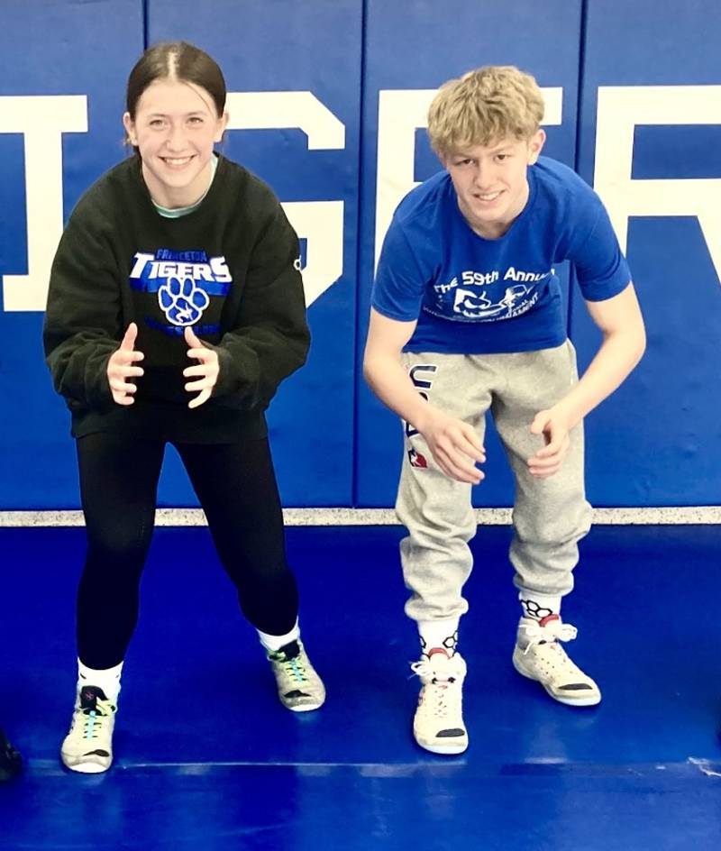 Princeton wrestles Izzy Gibson (left) and Augustus Swanson have qualified for the Illinois Greco Roman team at Nationals in Fargo, N.D. Swanson will also wrestle in Freestyle. Gibson became the first PHS girl to wrestle in the IHSA State Meet.