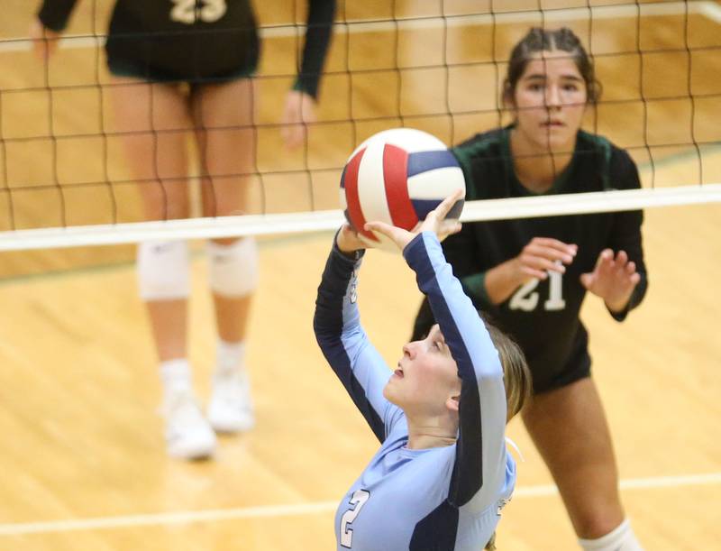 Bureau Valley's Emma Mussche sets the ball in the air as St. Bede's Lily Bosnich watches on Monday, Sept. 9, 2024 at St. Bede Academy.