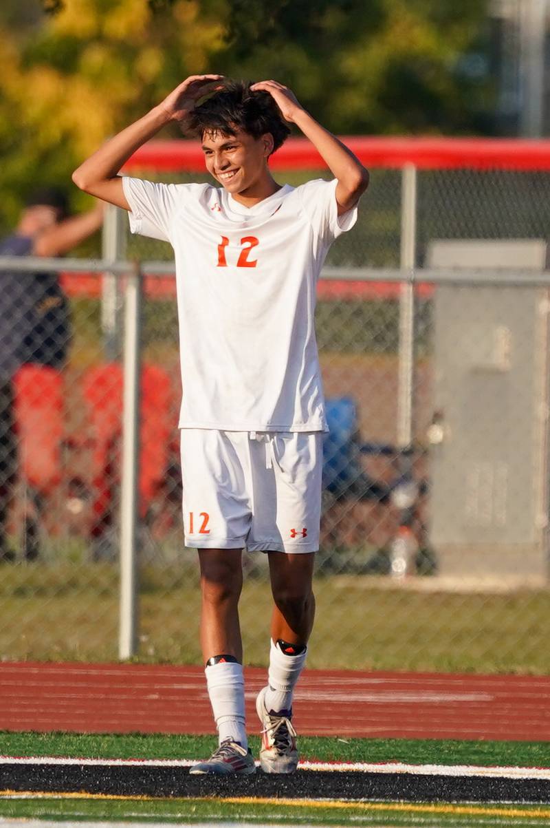 Oswego’s enrique castaneda III (12) reacts after scoring a goal against Yorkville during a soccer match at Yorkville High School on Tuesday, Sep 17, 2024.