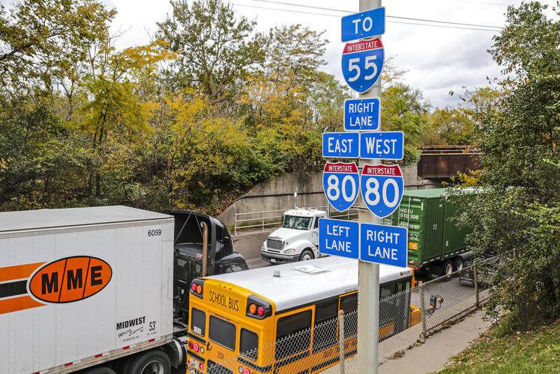 A sign guides motorists through the crossing of Interstates 55 and 80 in Joliet, where Cullinan Properties plans to develop Rock Run Crossings.