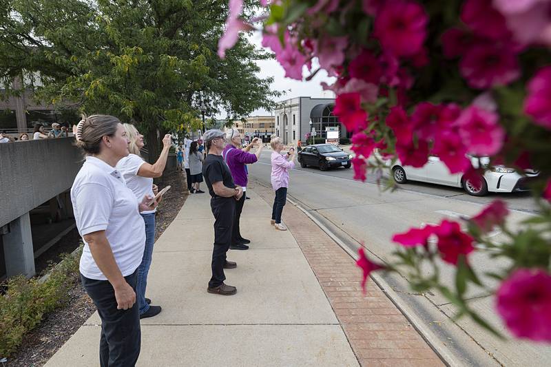 Fans watch the red carpet festivities Thursday, Aug. 22, 2024, outside of The Dixon.