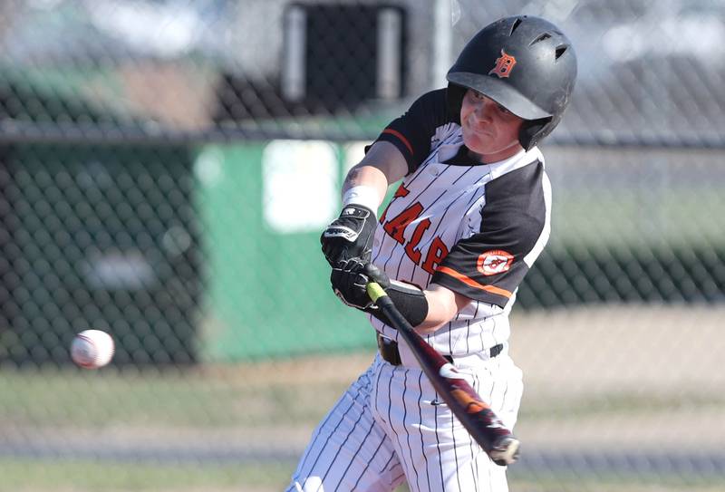 DeKalb's Nik Nelson takes a cut during their game against Metea Valley Thursday, April 13, 2023, at DeKalb High School.