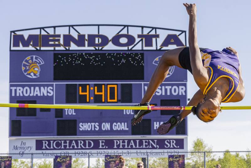 Mariyah Elam of Mendota High School jumps cleanly over the bur during the girls varsity high jump at Mendota High School on May 3, 2024.
