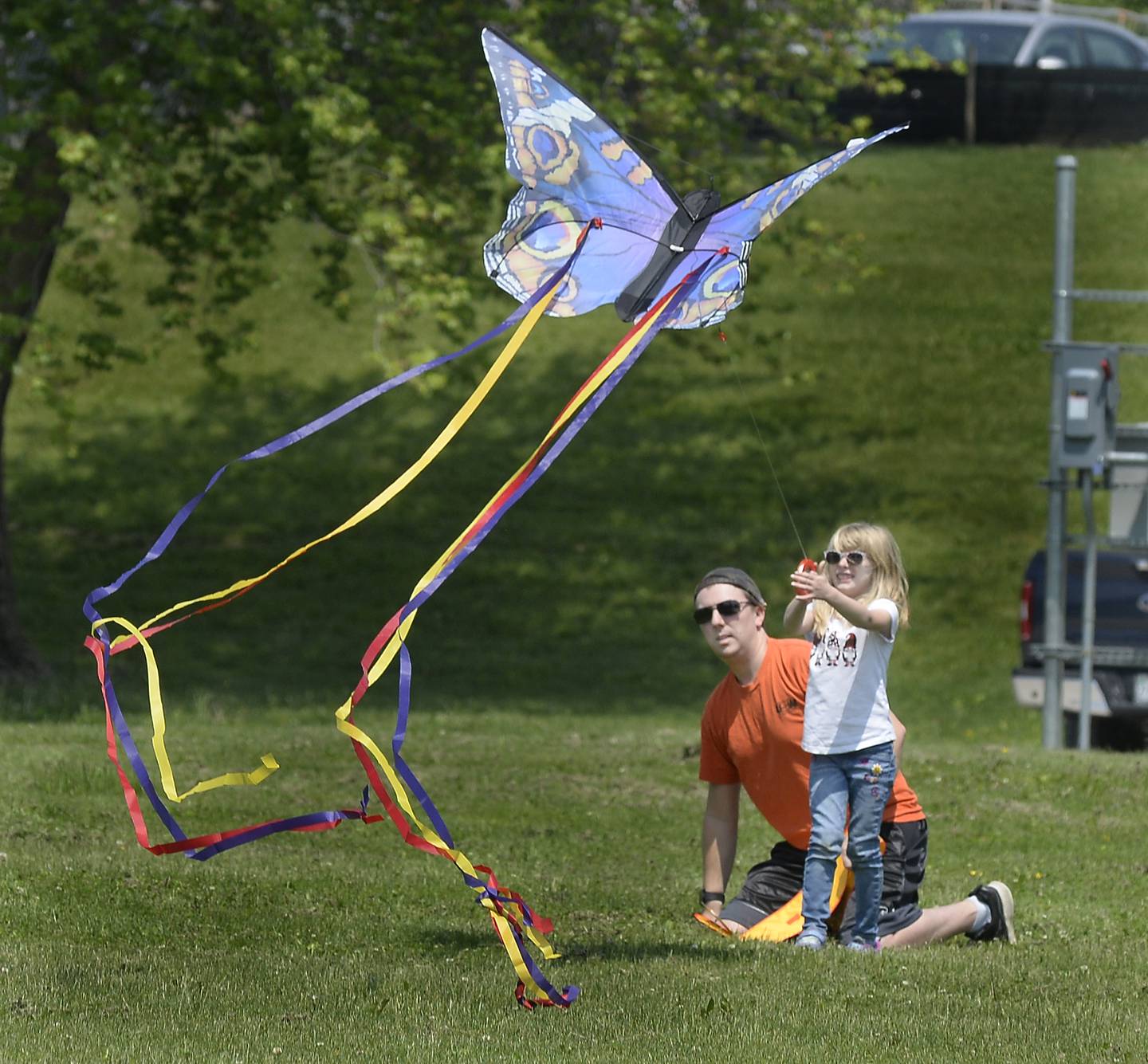With a little help from her father Derek, Sophia Waite gets her kite in the air Saturday, May 20, 2023, during the Kites in Flight festival at Riverfront Park in Ottawa. Kite flying as well as other activities took place Saturday and Sunday.