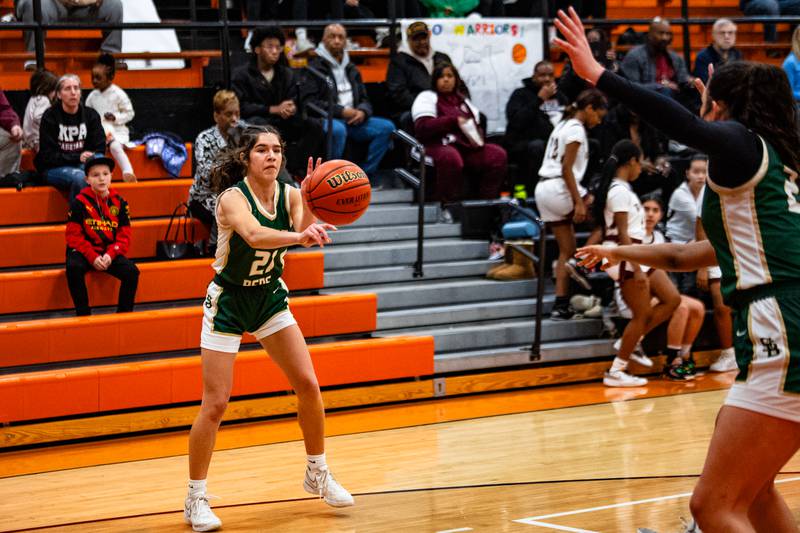 St. Bede'sLily Bosnich passes to Ali Bosnich during the 1A Sectional game on Tuesday Feb. 20, 2024 at Gardner-South Wilmington High School in Gardner