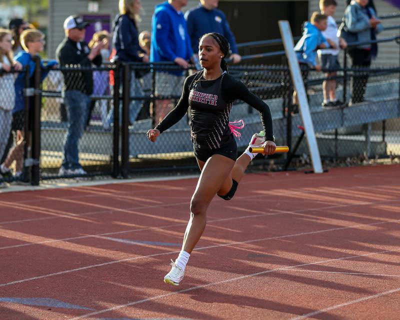 Plainfield North's Taylor McClain anchors Plainfield North for the win in the 4x100-meter relay at Friday's Class 3A Downers Grove North Sectional girls track and field meet.