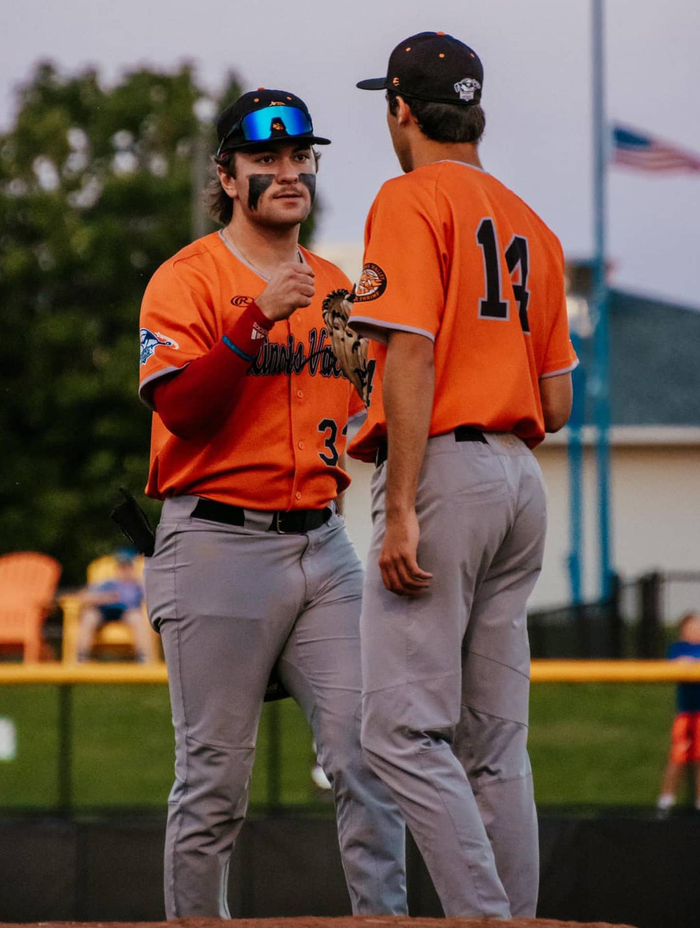 Pambos Nicoloudes (left) fist bumps Jeffrey Behrends during the Illinois Valley Pistol Shrimp's 8-4 victory over the Clinton LumberKings on Wednesday, July 17, 2024 in Clinton, Iowa.